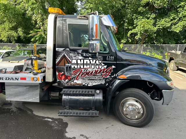 Andy's Towing branded International 4300 flatbed